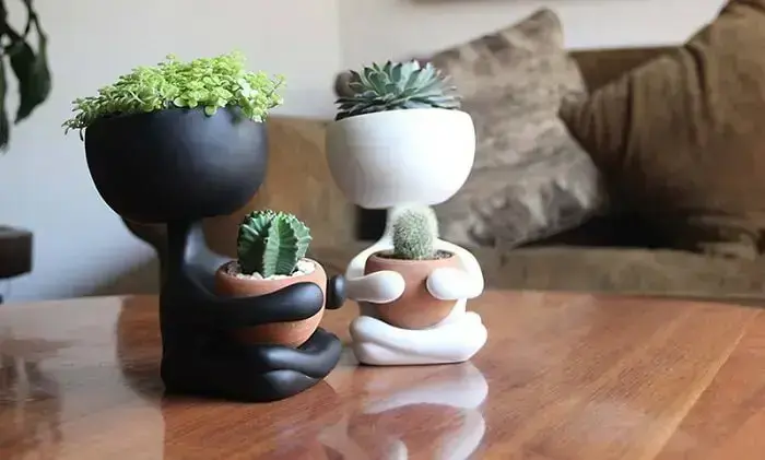 Vasos de plantas super criativo em tons de branco e preto Vasos de plantas super criativo em tons de branco e preto