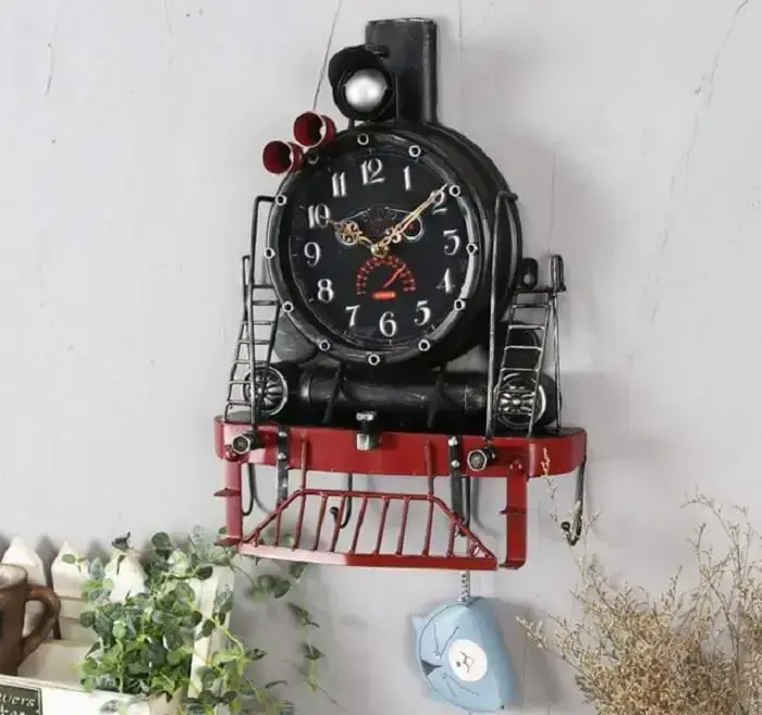 Relógio de parede feito de ferro com design que simula uma Maria Fumaça Relógio de parede feito de ferro com design que simula uma Maria Fumaça