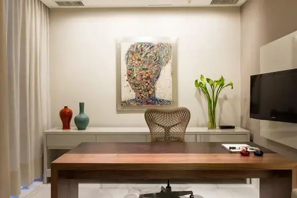 Decoração clean com quadro decorativo colorido Decoração clean com quadro decorativo colorido