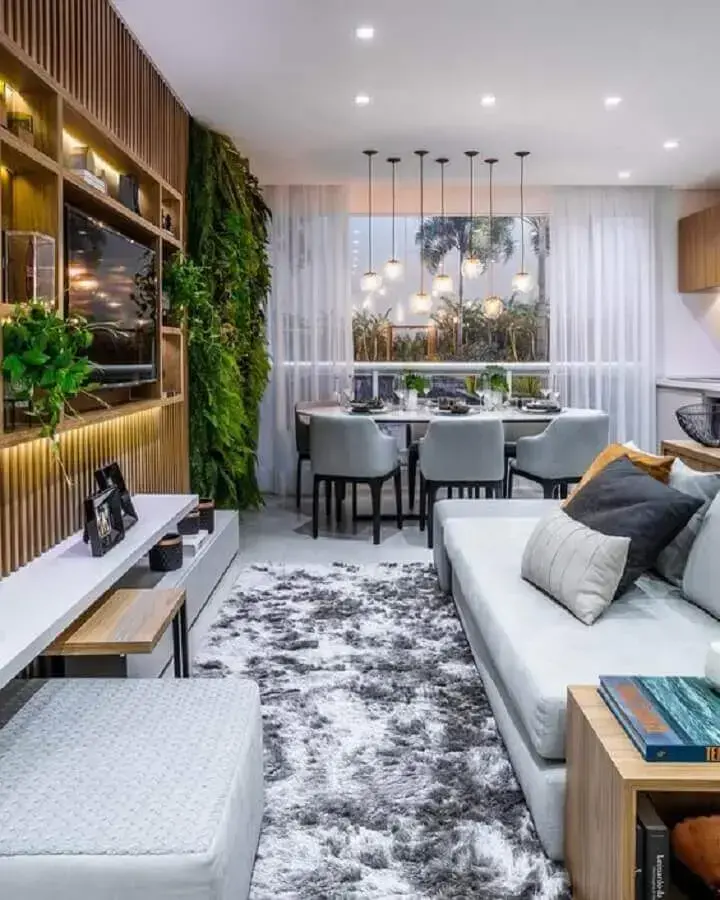 tapete felpudo cinza para decoração de sala de estar moderna planejada tapete felpudo cinza para decoração de sala de estar moderna planejada Foto Archello