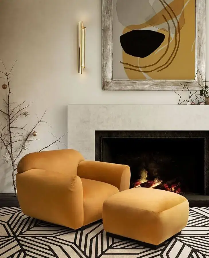 Poltrona confortável moderna para decoração de sala com lareira Poltrona confortável moderna para decoração de sala com lareira Foto Pinterest