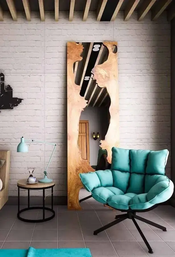 Quarto estilo industrial decorado com poltrona confortável verde água Quarto estilo industrial decorado com poltrona confortável verde água Foto Futurist Architecture