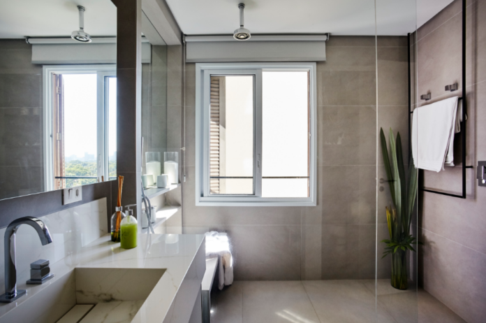 Além de projetos industriais, o porcelanato cimentício pode ser usado em propostas contemporâneas e minimalistas – Foto: Illana Bresser | Projeto: Juliana Fabrizzi